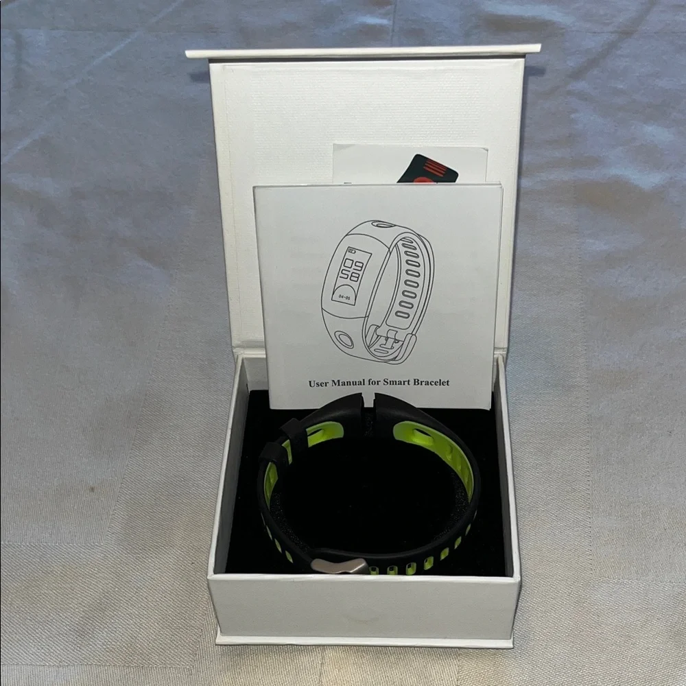 Smart Bracelet with Green and Black Band Replacement.